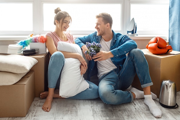 Young family couple bought their first small apartment