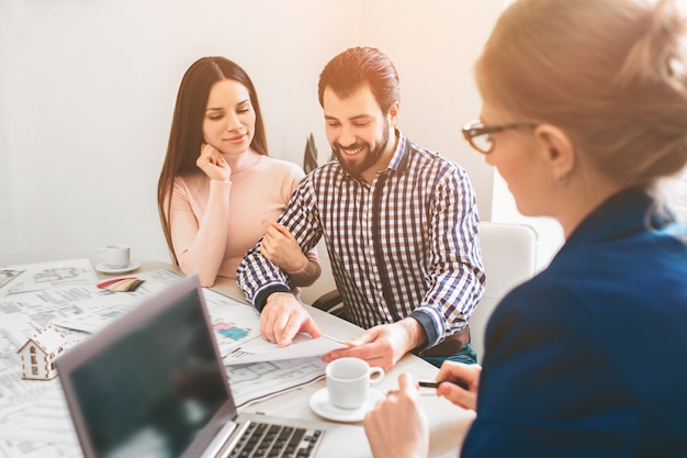 Young family couple purchase property real estate 