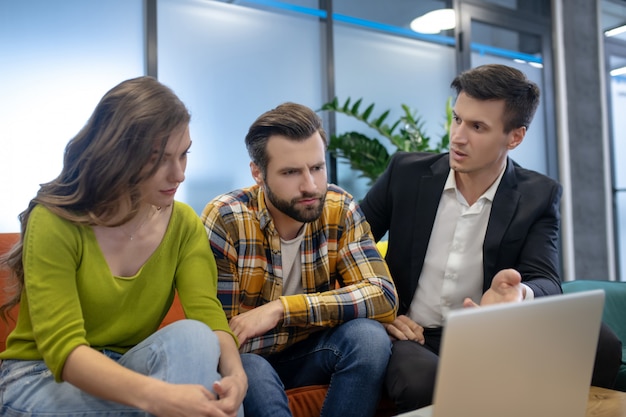 Young family having a consultation with a lawyer