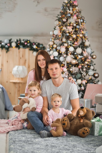 A young family is resting at home during the new year holidays 2041