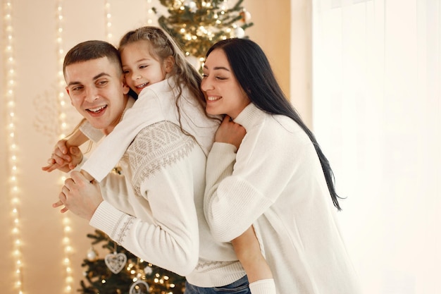 Young family spending time together and celebrating New Year's Eve
