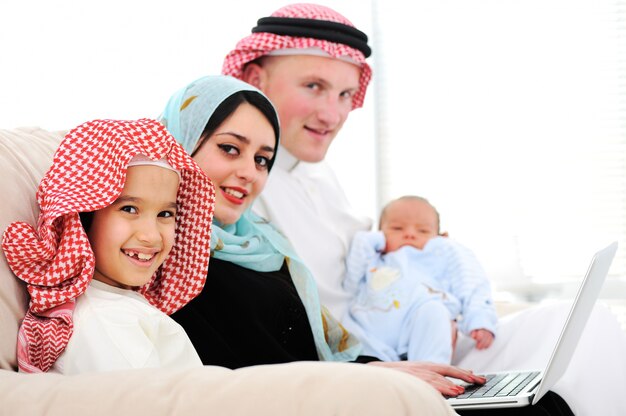 Young family with new baby at home