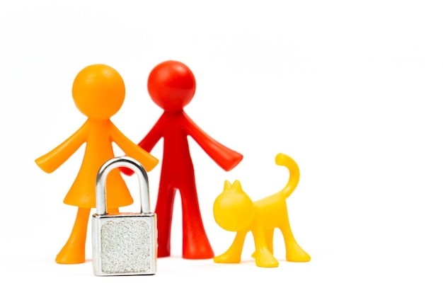 Young family with pet and lock Ban on children or adoption concept Isolated on a white background photo