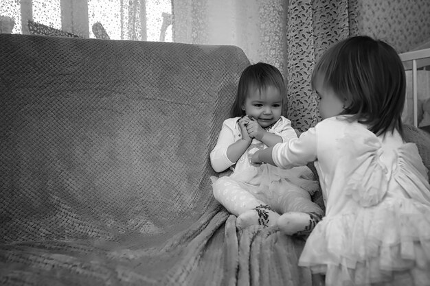 A young family with twins girls in the New Year's holiday