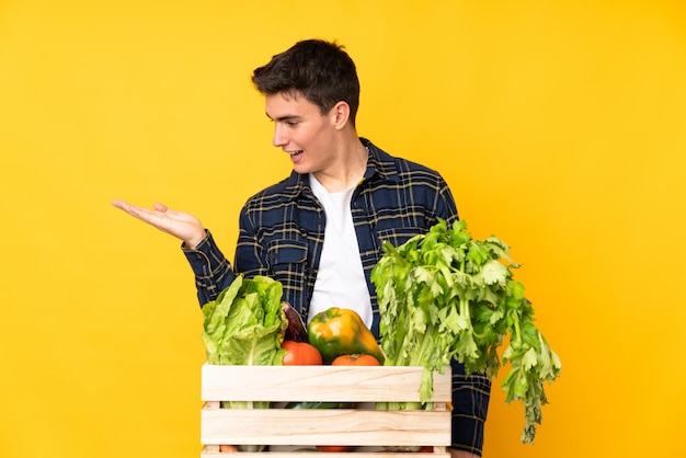 Young farmen man over isolated background