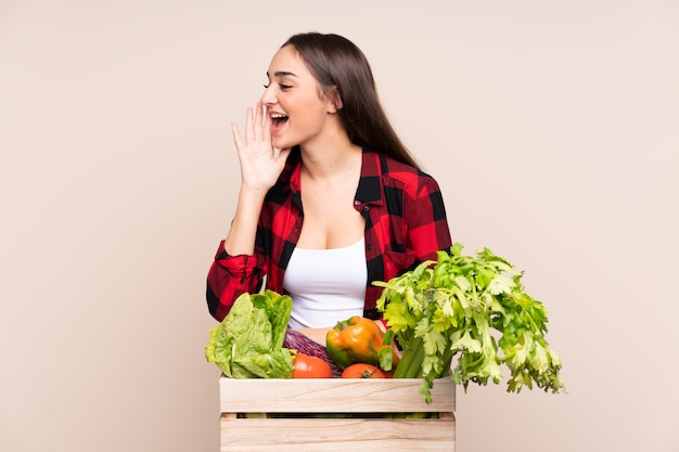 Young farmer woman over isolated