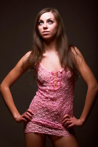 Young fashion model over black background