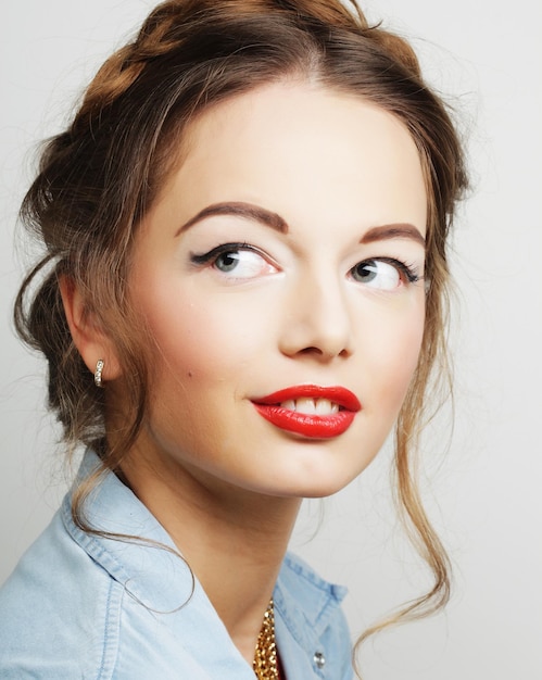 young fashion model with red lips