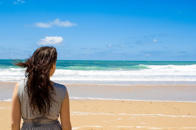 Young fashion woman relax on the beach