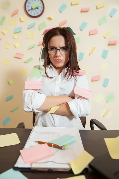 Young female bookkeeper nerves on a limit