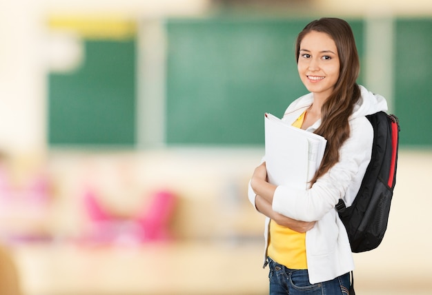 Young Female College Student  on background