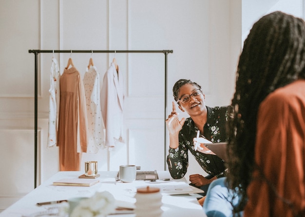 Young female designer in a boutique