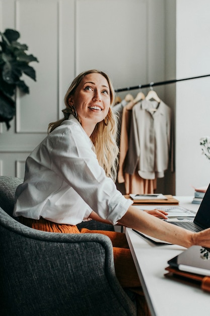 Young female designer in a boutique