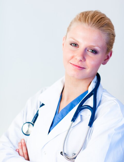 Young female doctor looking at camera