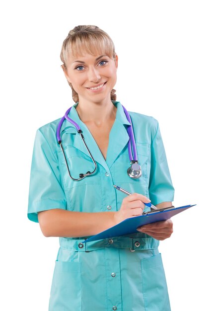 A young female doctor with clipboard smiling isolated