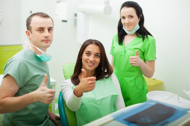 Young female patient visiting dentist office