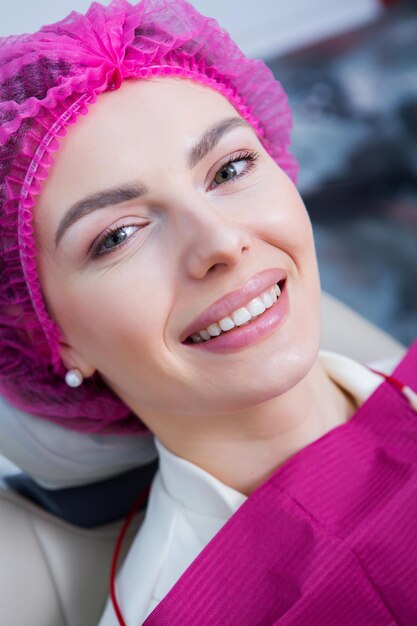 Young Female patient with pretty smile examining dental inspection at dentist clinic Healthy teeth