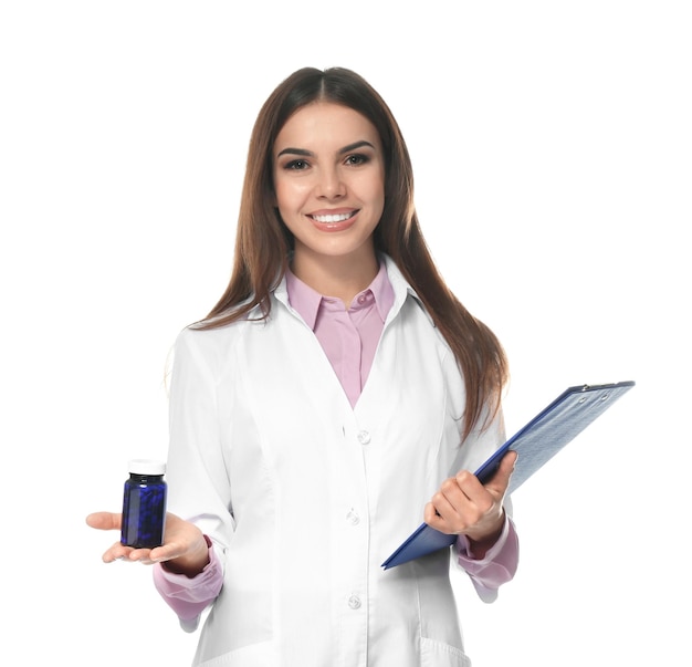 Premium Photo Young female pharmacist with medicament and clipboard