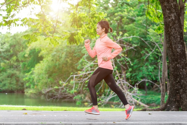 Young female running in the park