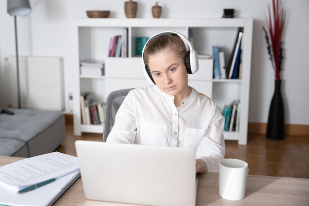 Young female student homeschooling