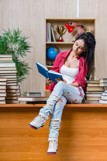 Young female student preparing for college school exams