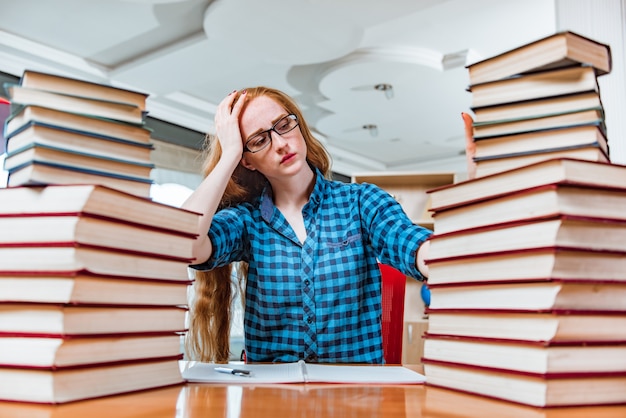 The young female student preparing for exams