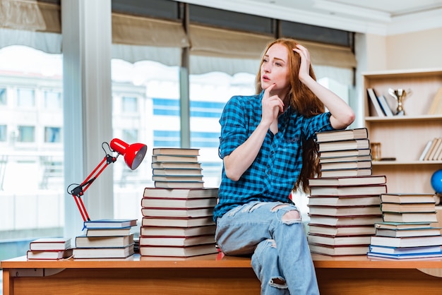 Young female student preparing for exams