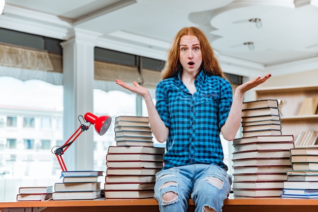 Young female student preparing for exams