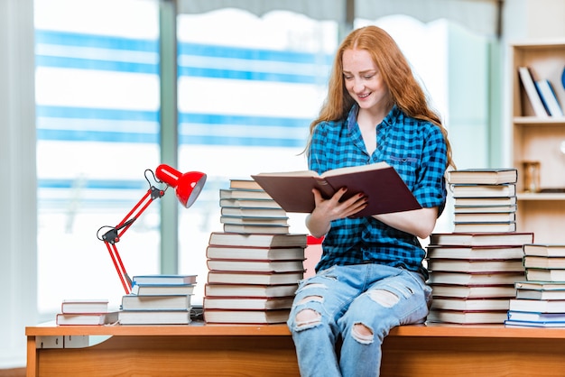 Young female student preparing for exams