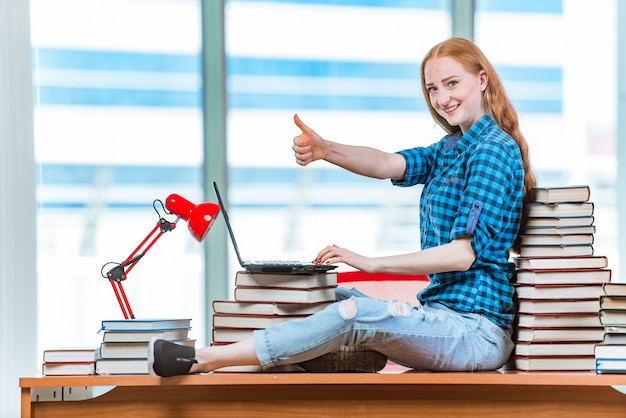 Young female student preparing for exams