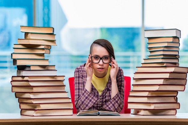 Young female student preparing for exams