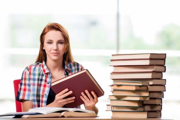 Young female student preparing for exams