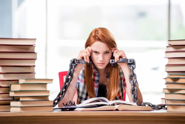 Young female student preparing for exams