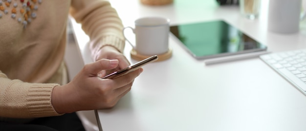 Young female using smartphone