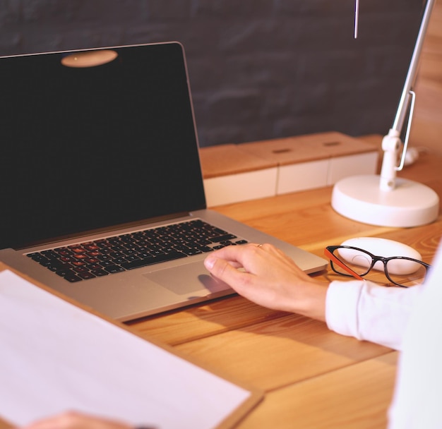 Young female working sitting at a desk