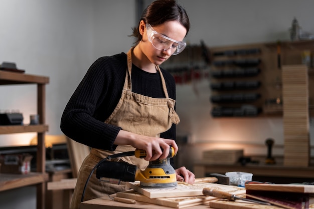 Young female working in a wood engraving workshop