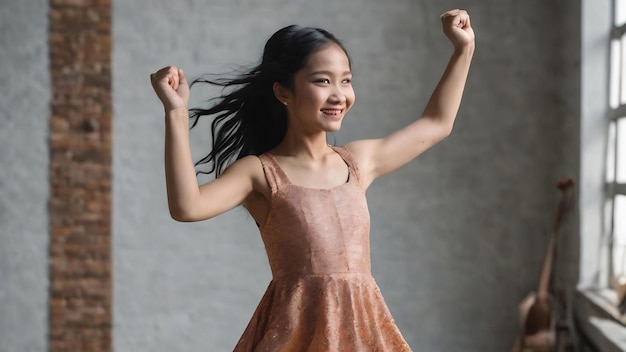 Young filipina with long black hair in studio celebrating a special day jumps and raise arms