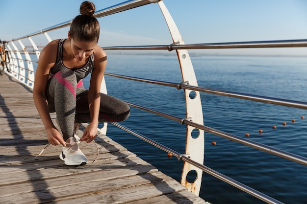 Young fit sportswoman working out