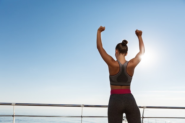 Young fit sportswoman working out