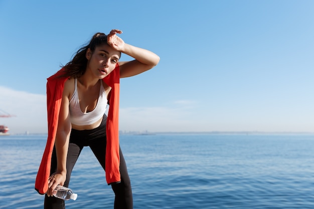 Young fit sportswoman working out