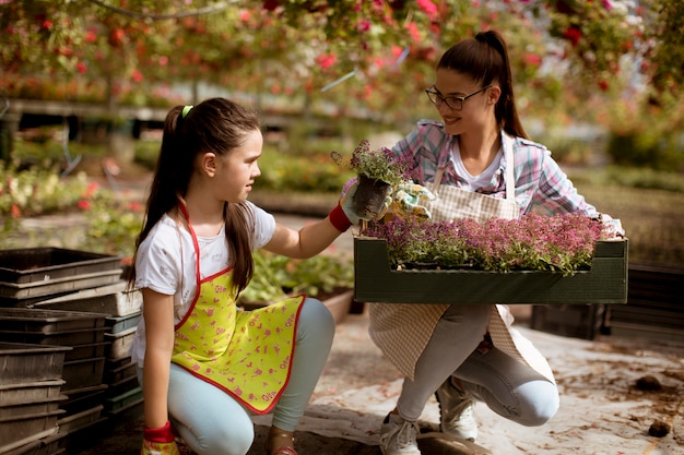 Young  florists enjoying work in the greenhouse