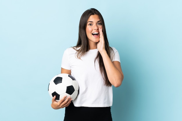 Young football player brazilian woman isolated