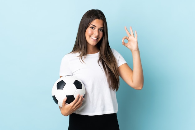 Young football player brazilian young woman isolated