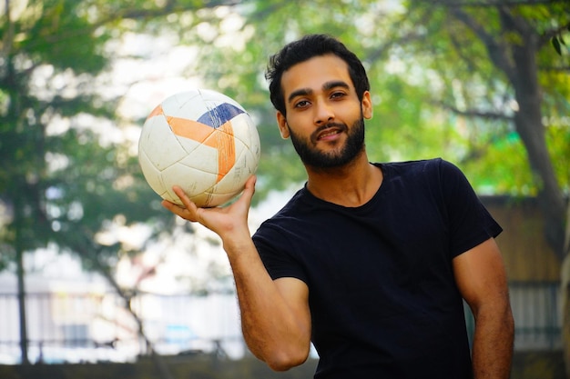 Young football player at the football field