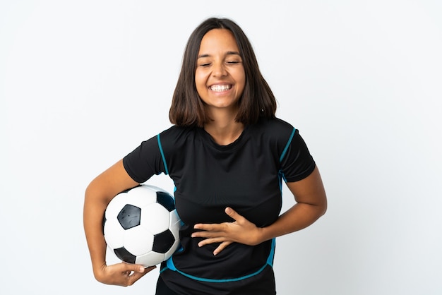 Young football player woman isolated smiling a lot