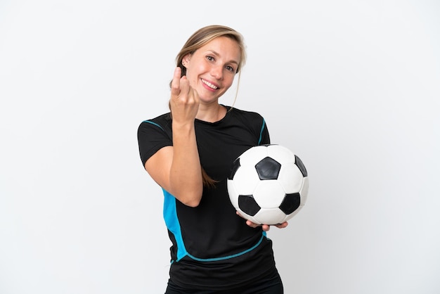 Young football player woman isolated on white background doing coming gesture