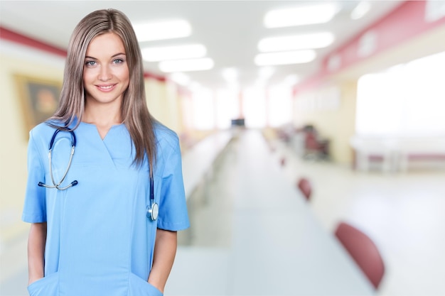 Young Friendly Nurse in Blue Scrubs