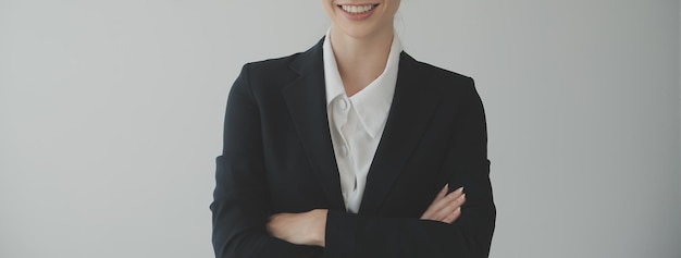 Young friendly operator woman agent with headsets working in a call centre