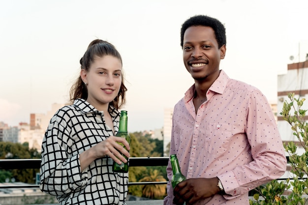 Young friends having fun at outdoor rooftop