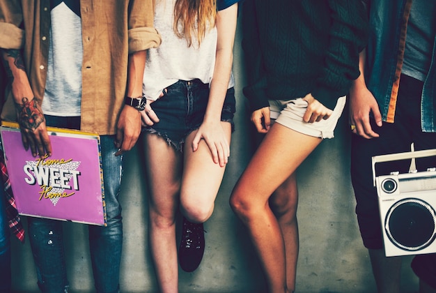 Young friends listening to music